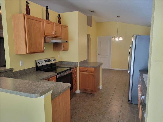 kitchen with dark tile patterned flooring, hanging light fixtures, kitchen peninsula, a notable chandelier, and appliances with stainless steel finishes