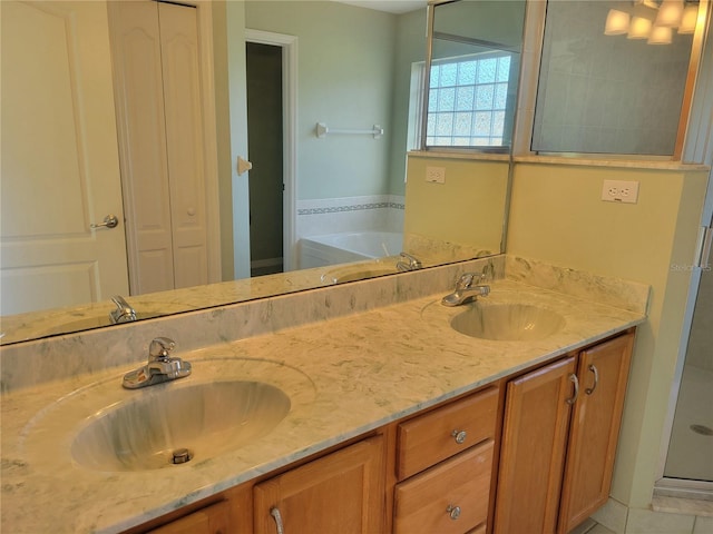 19 Cedar Dr, Ocala, FL 34472 - bathroom featuring double vanity, a garden tub, a closet, and a shower