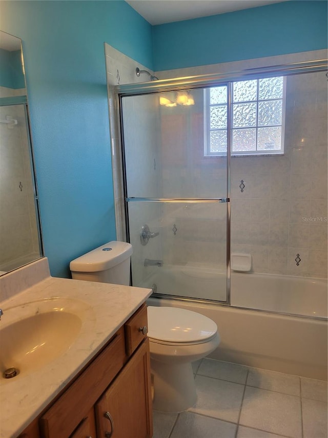 19 Cedar Dr, Ocala, FL 34472 - bathroom with vanity, tile patterned floors, and enclosed tub / shower combo