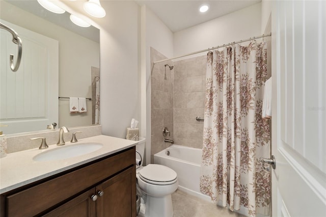 full bathroom featuring toilet, shower / tub combo with curtain, and vanity