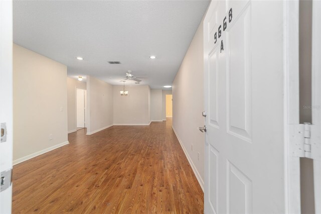 unfurnished room featuring wood-type flooring and ceiling fan