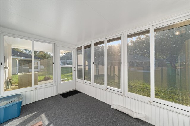 unfurnished sunroom with a wealth of natural light