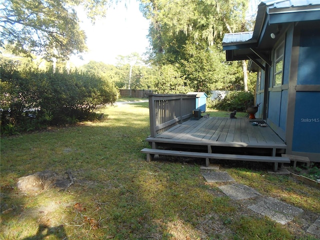 view of yard with a deck