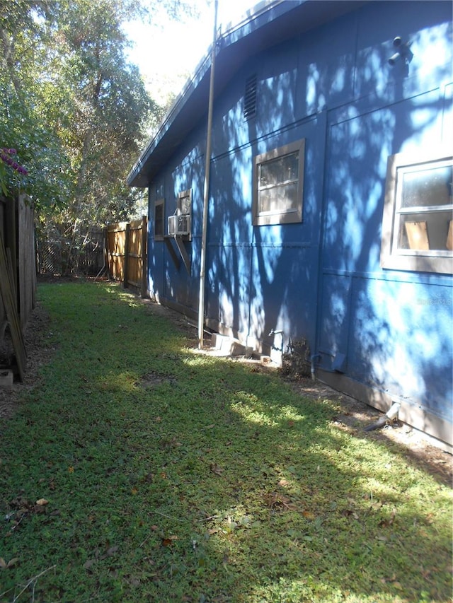 view of property exterior featuring a yard