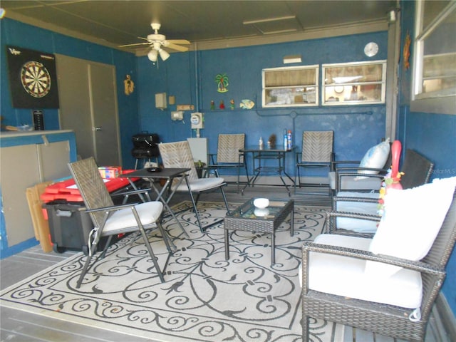 living room featuring ceiling fan