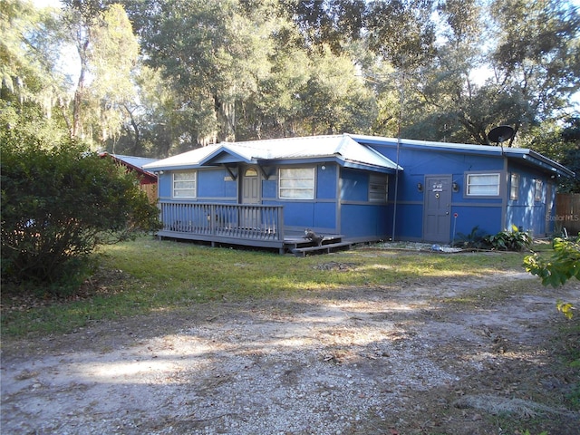 view of front of property with a deck