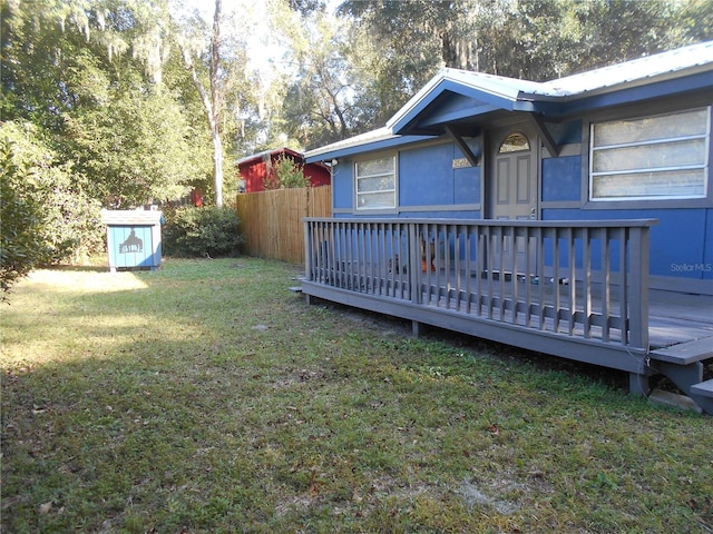 view of yard featuring a wooden deck