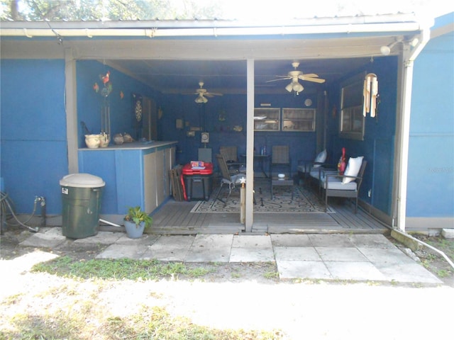 view of patio featuring outdoor lounge area and ceiling fan