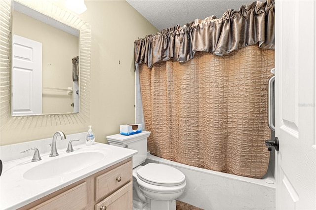 full bathroom with vanity, toilet, a textured ceiling, and shower / bath combo with shower curtain