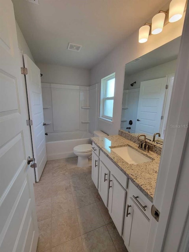 full bathroom with vanity, tile patterned flooring, toilet, and tub / shower combination