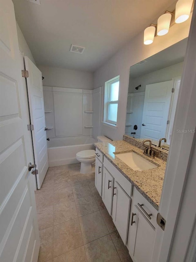 5892 SW 82nd Ln, Ocala, FL 34476 - full bathroom featuring toilet, tub / shower combination, vanity, and visible vents