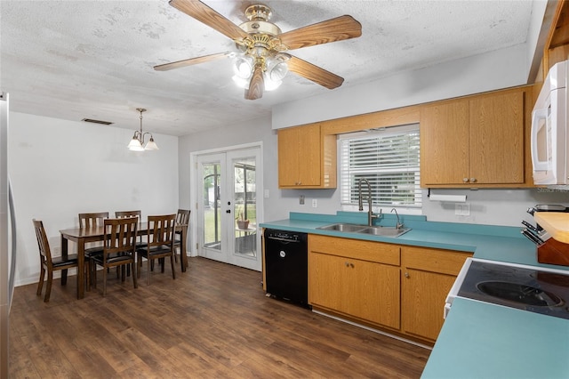 kitchen featuring sink, dark wood-type flooring, plenty of natural light, and white appliances