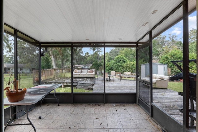 sunroom with wooden ceiling