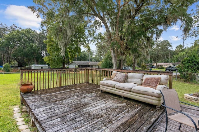 deck featuring a lawn