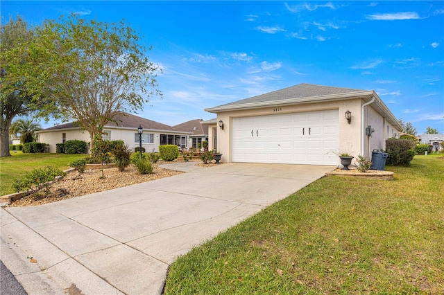 single story home with a front lawn and a garage