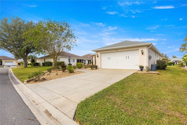 ranch-style house with a garage and a front yard