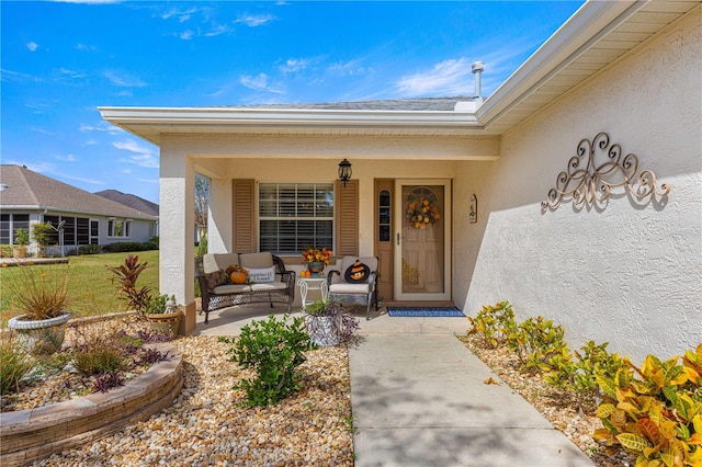 doorway to property with covered porch