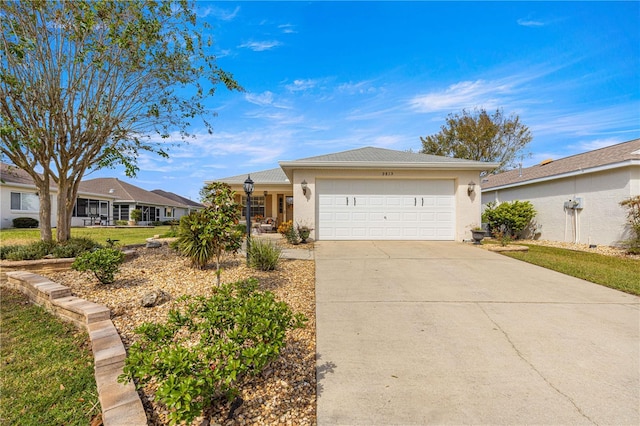 single story home with a garage