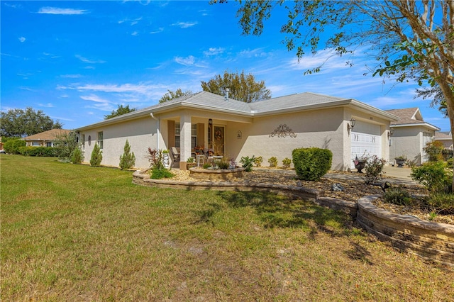 view of front of house with a front lawn and a garage