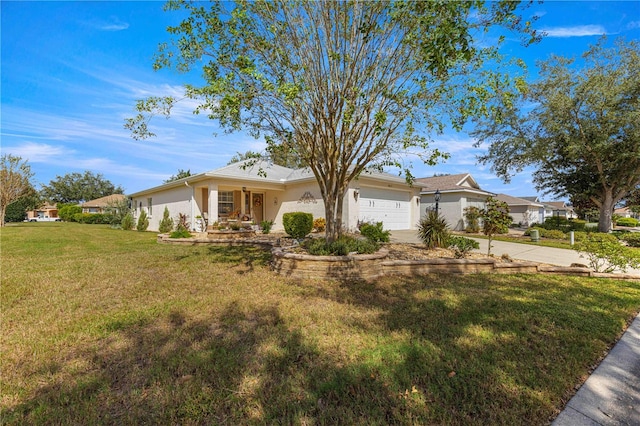 ranch-style home featuring a porch, a garage, and a front yard