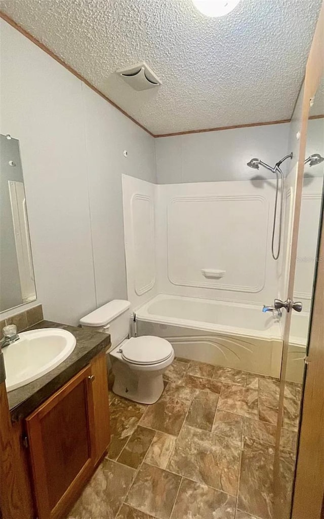 full bathroom with vanity, toilet, a textured ceiling, and bathing tub / shower combination