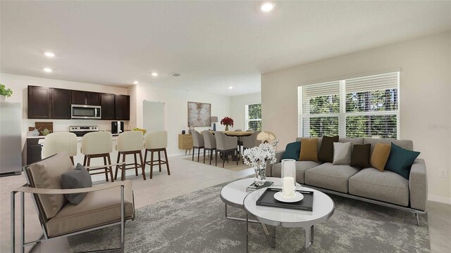 living room with light tile patterned floors