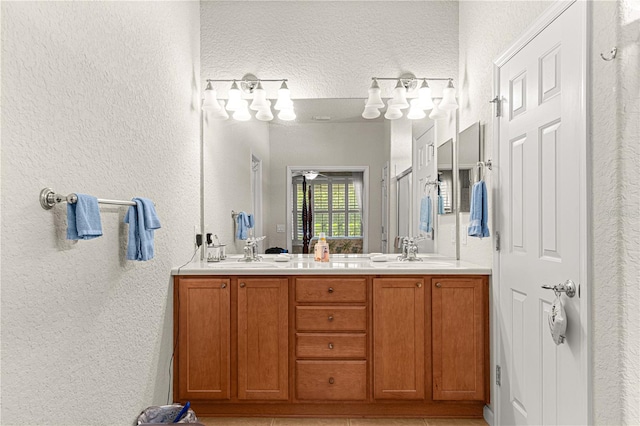 bathroom featuring vanity and tile patterned flooring