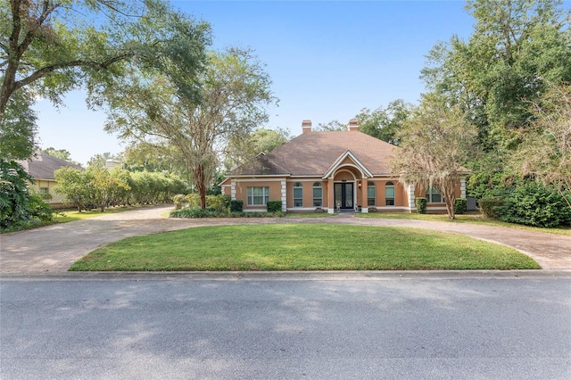 view of front of house featuring a front lawn and a porch