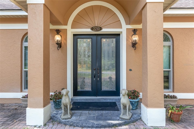 doorway to property featuring french doors