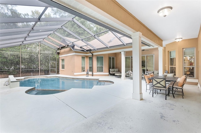 view of swimming pool with an outdoor living space, a patio area, and a lanai