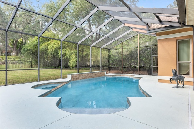 view of pool featuring a patio and glass enclosure