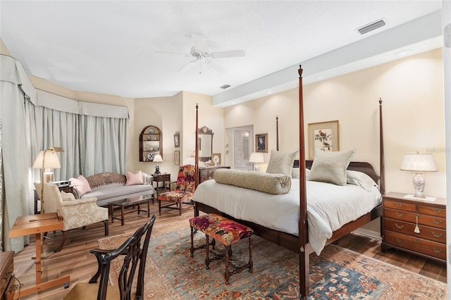 bedroom featuring ceiling fan and wood-type flooring