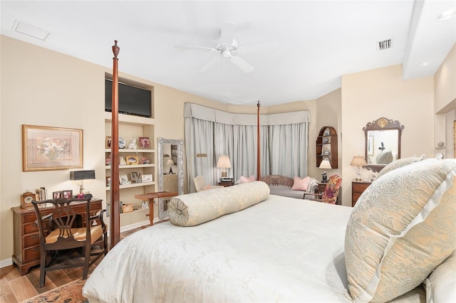 bedroom featuring light hardwood / wood-style floors and ceiling fan