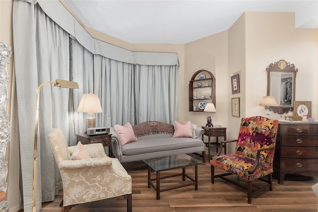 living area with hardwood / wood-style flooring