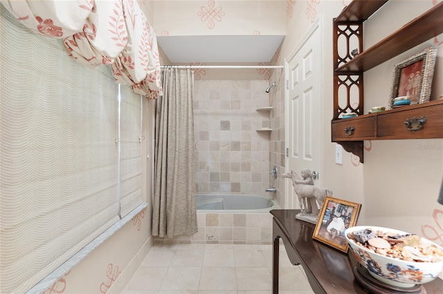 bathroom featuring tile patterned flooring and shower / bath combo