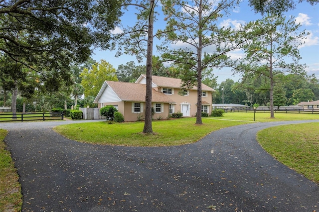 view of front of property with a front yard