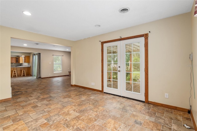 spare room with french doors