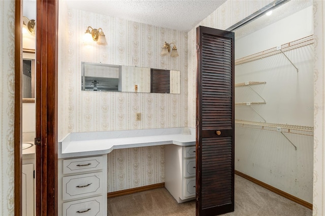 bathroom featuring a textured ceiling