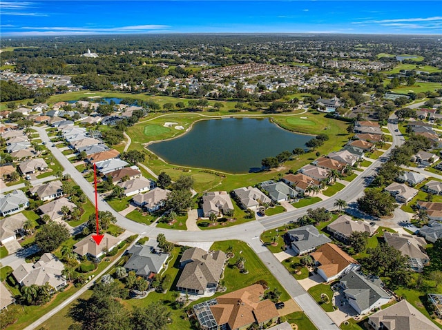 aerial view featuring a water view, golf course view, and a residential view