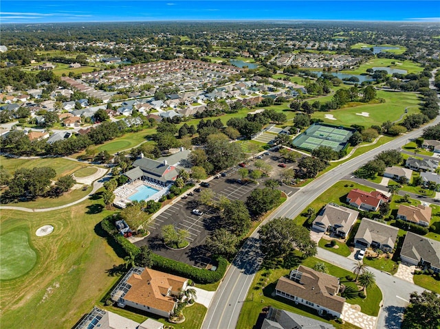 aerial view with a water view, golf course view, and a residential view