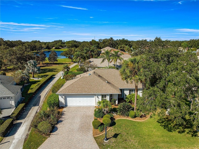 birds eye view of property featuring a water view