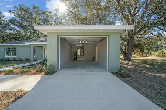 property entrance featuring a carport