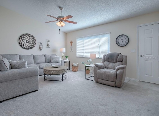 10783 SE 178th St, Summerfield, FL 34491 - living area with carpet floors, a ceiling fan, a textured ceiling, and baseboards