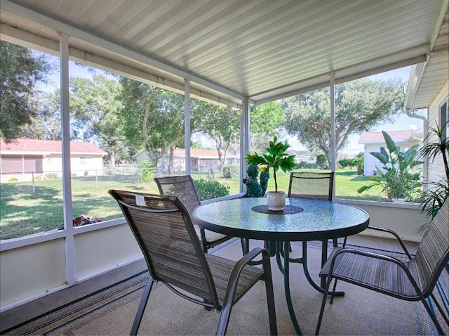 10783 SE 178th St, Summerfield, FL 34491 - sunroom featuring outdoor dining area and a healthy amount of sunlight