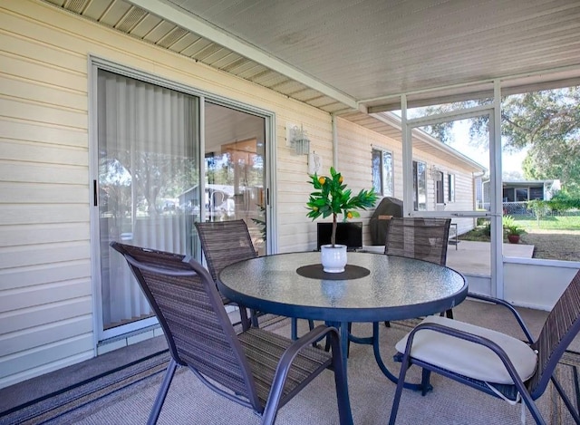10783 SE 178th St, Summerfield, FL 34491 - sunroom with outdoor dining area