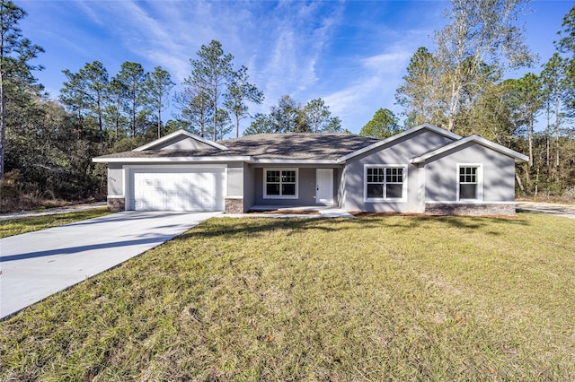 single story home with a garage and a front lawn