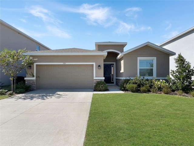 prairie-style home featuring an attached garage, stone siding, driveway, stucco siding, and a front lawn
