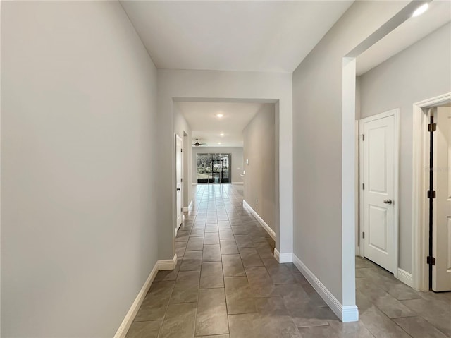 corridor with baseboards