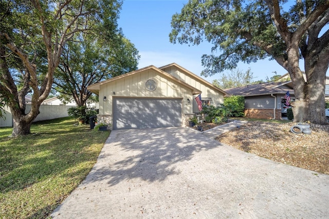 single story home with a garage and a front yard