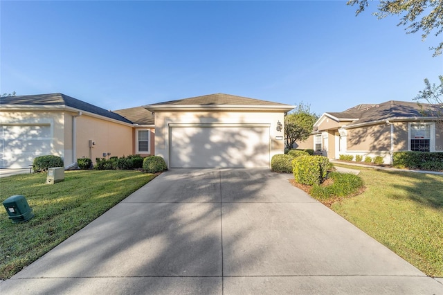 single story home featuring a front yard and a garage